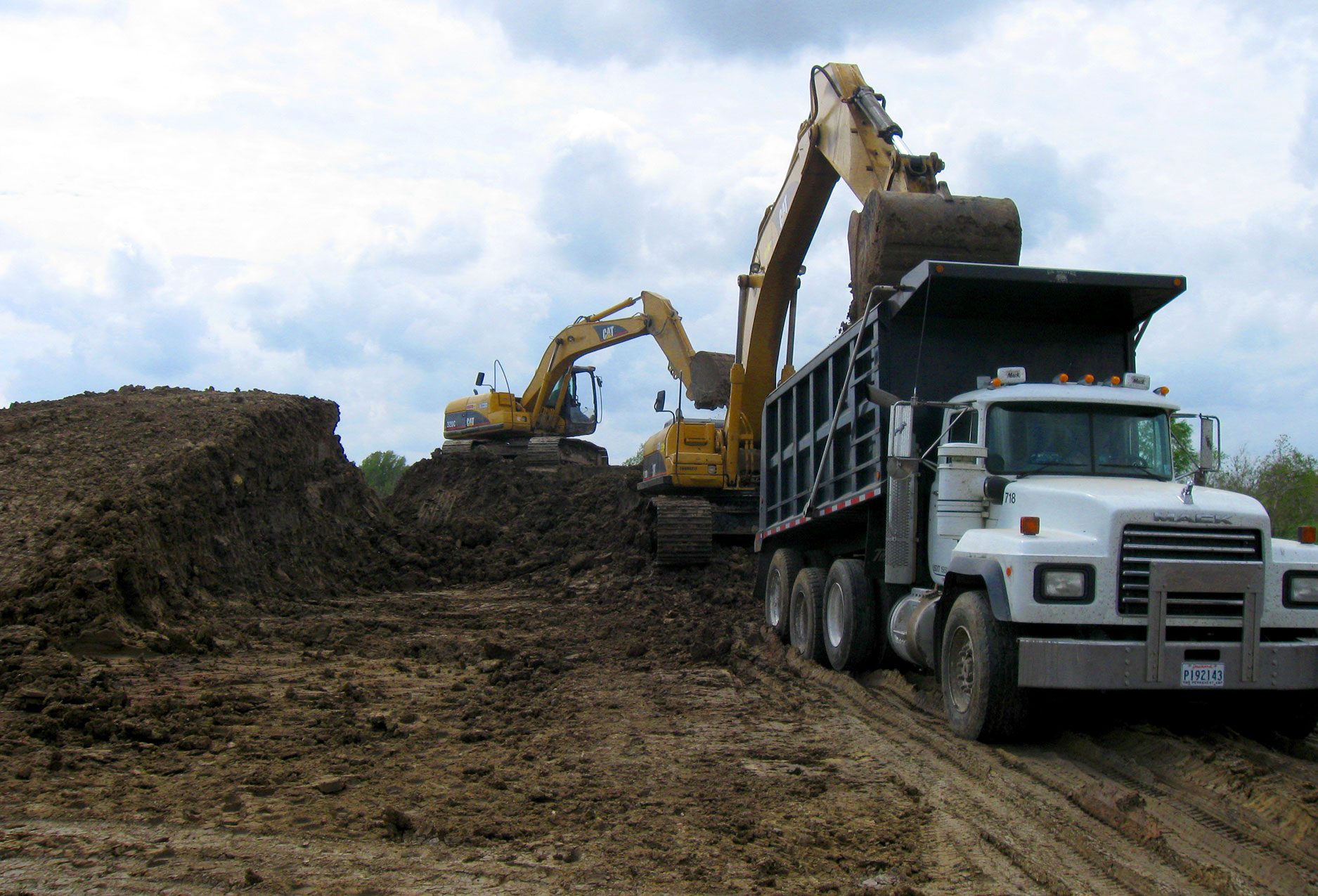 Excavators and Dump Truck